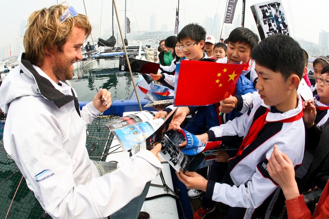 The Wave, Muscats Leigh McMillan meeting local Qingdao children - Extreme Sailing Series 2012 &copy; QDYA
